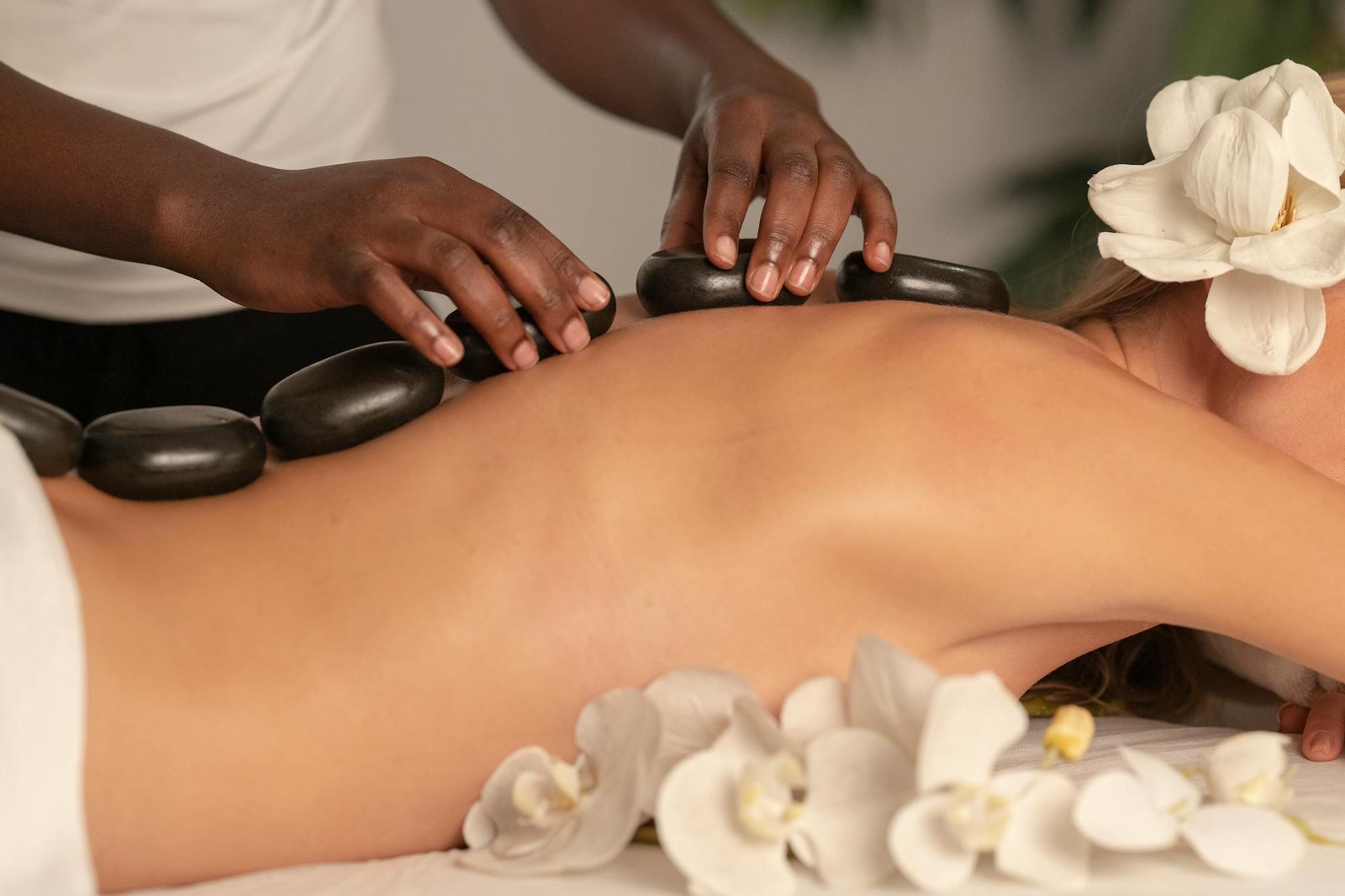 A serene spa session featuring hot stone massage for relaxation and wellness.